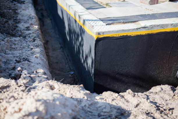 Professional Emergency Waterproofing technician working in Ontario, NY
